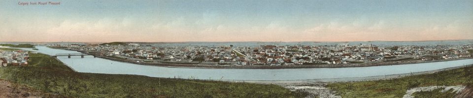 Wide postcard view of Calgary from Mount Pleasant, 1911