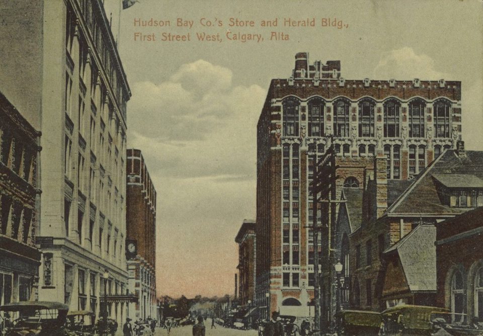 Postcard of the Hudson's Bay store and the Herald Building, Calgary